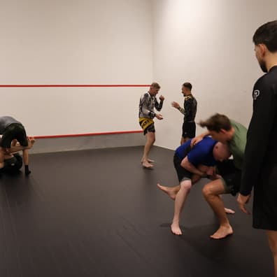 Students training Brazilian Jiu-Jitsu at McGuigan's School of BJJ in Longridge, Preston